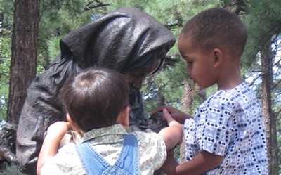 Children a life-size bronze sculpture allegory installation by James Muir